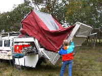 Tent follows lid as it opens